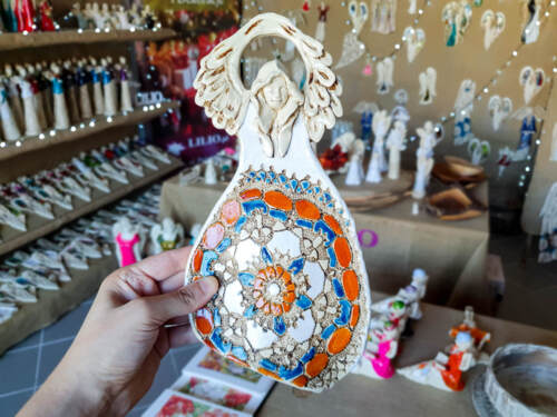 Anioł Obfitości - biały pomarańcz niebieski -  31 x 16 cm figurka dekoracyjna gipsowa